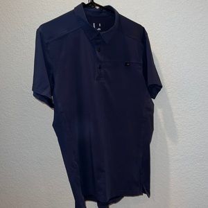 Arc’teryx men’s polo and medium navy blue never worn
